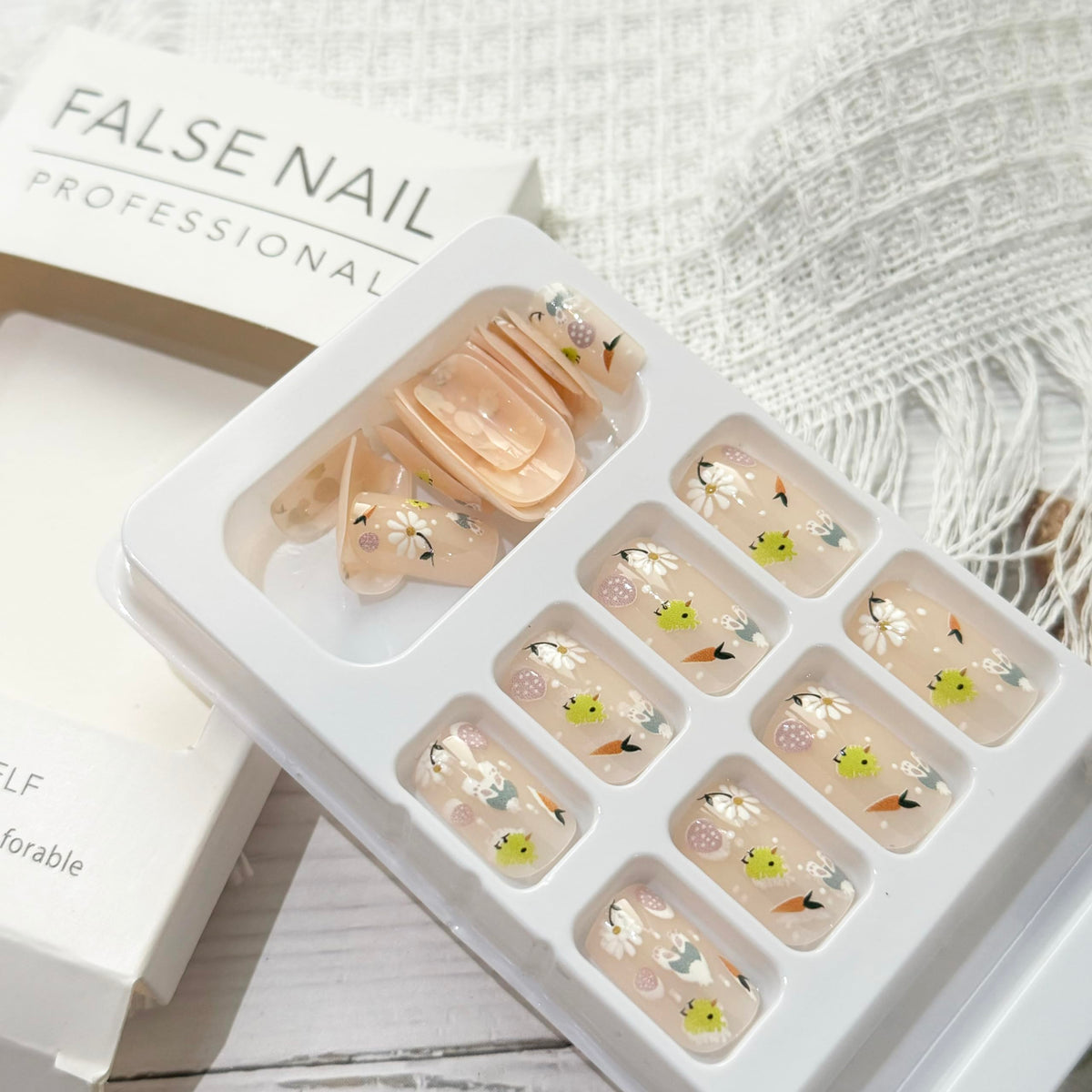 Press on Nails Easter Fake Nails with Flower Chick Carrot Easter Egg Designs Acrylic Nails Stick on Nails Full Cover Cute Glossy Party Glue on Nails for Women Girls Easter Manicure Kit