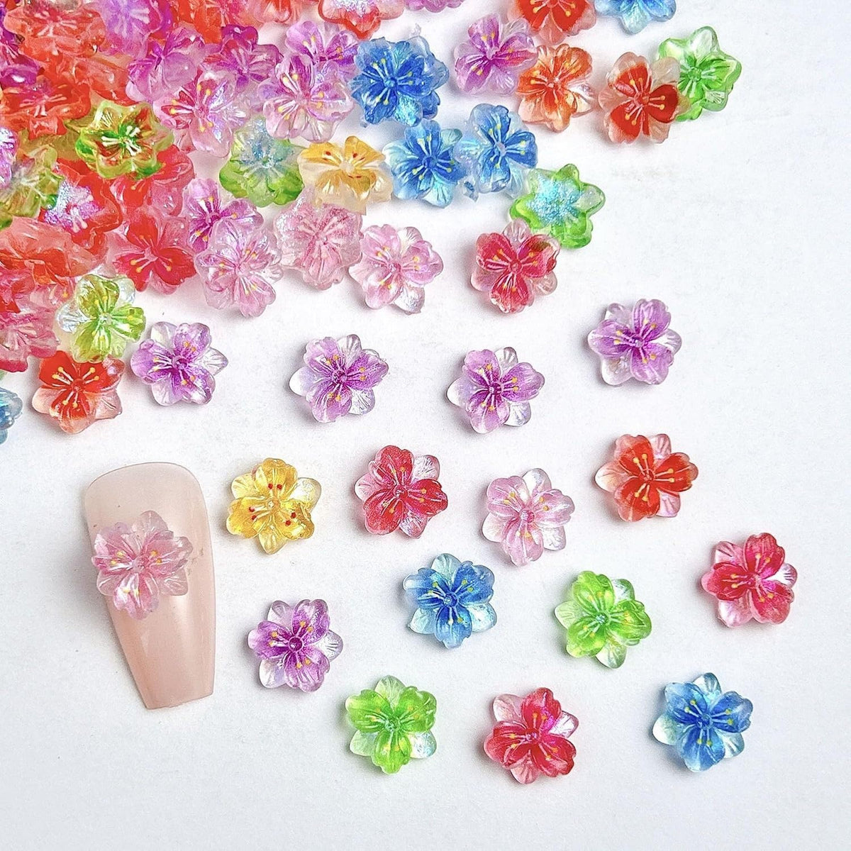 100PCS Glitter Peach Blossom Nail Art Charms 3D with Ice Clear Powder Flowers Mixed Spring Summer Jelly Color Floral Diamond Nail Jewelry Tiny Flowers Nail Design for Women Manicure Supplies