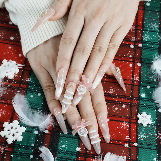Tesytto Press On Nails Long Stiletto, Sheer Pink Glitter Nails with 3D Bow & Snowflake Design, Sparkly Silver French Tip Glossy Fake Nails, Full Cover Acrylic Nails (Christmas Snow Globe,M)