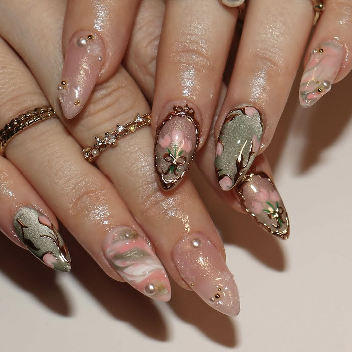 Medium Press on Nails Almond Fake Nails Pink Acrylic Nail Press Ons Seeneey Gold Charm Designs Floral Stick on Nail for Women 27pcs