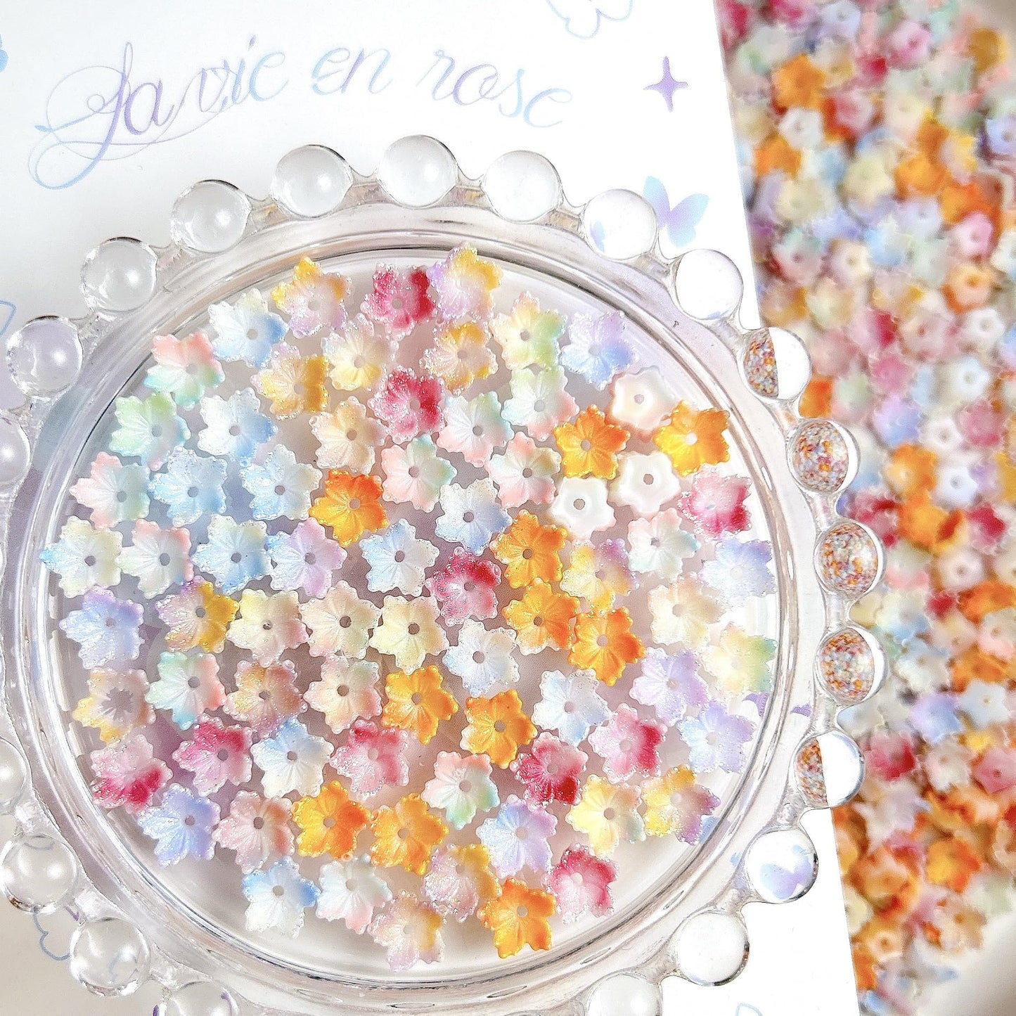 AWDSLUY 200Pcs Colorful Flower Nail Art Charms Cute Spring Summer Floral Nail Charms 3D Mix Color Ombre Flatback Nail Rhinestones Cute Glow in The Dark Blossoms Resin Nails Jewels Nail Gems for Women