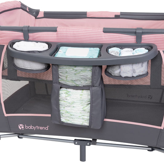 Baby Trend Passport Carriage Travel System with Bassinet, Changing Table, Toys, and Music Center, Dash Pink