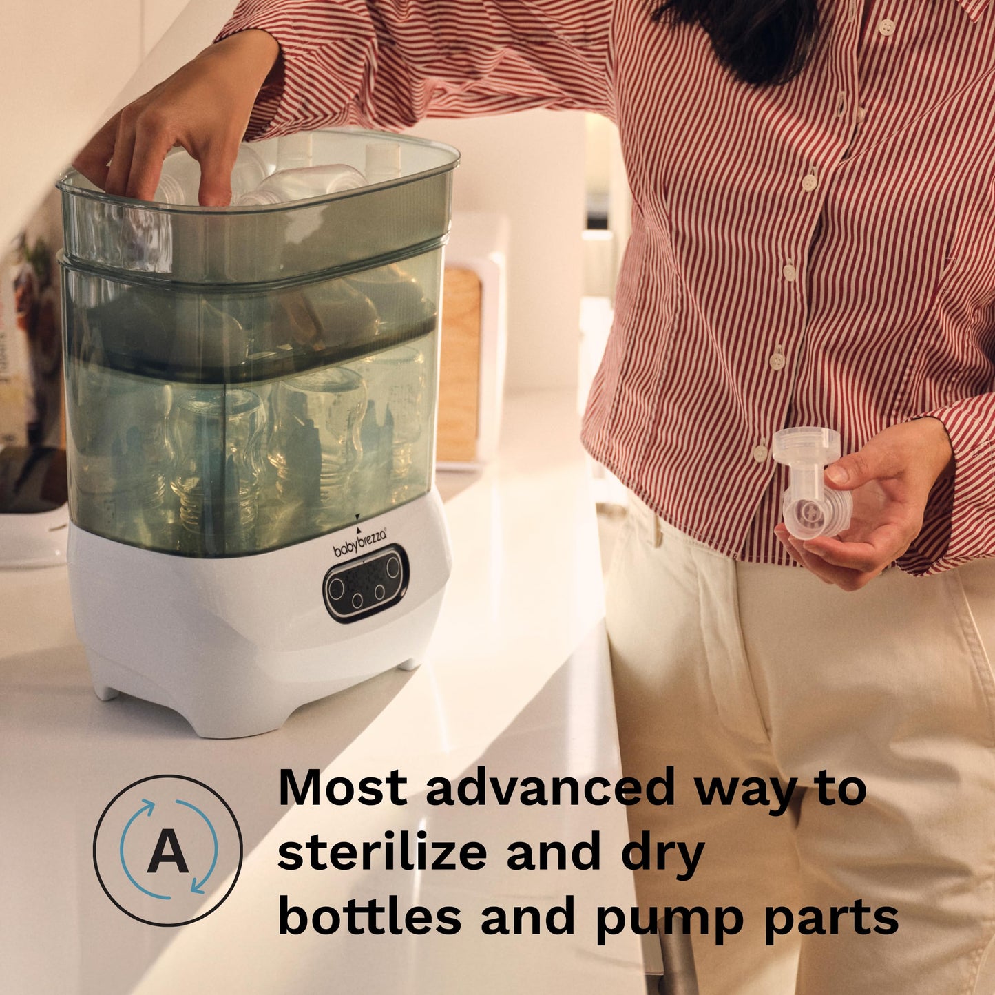 Baby Brezza Bottle Sterilizer and Dryer Advanced – 33% Faster - Largest Capacity Steam Sanitizer - Universal Sterilization Machine for All Bottles + Pump Parts - HEPA Air Filter