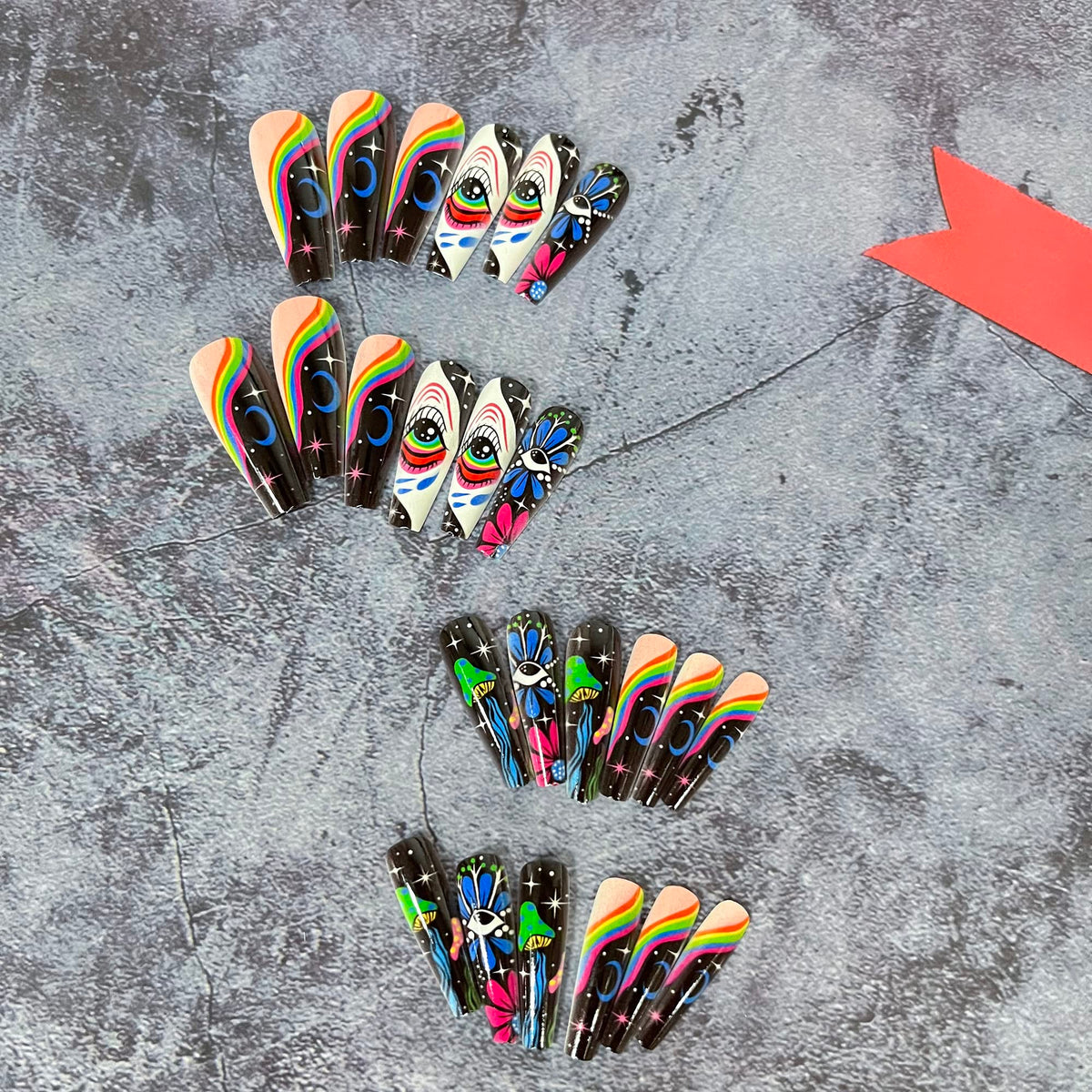 Long Press on Nails Coffin Fake Graffiti Flower Full Cover Glue Eye Stars Moon Acrylic with Rainbow Designs Nail Art Decorations for Women Girls